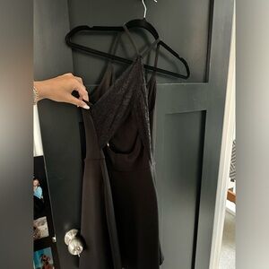 Freshly dry cleaned black mini dress
